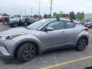 2018 Toyota C-HR XLE with VIN NMTKHMBX8JR032422, listed as a IAAI auction lot 42038240 with 132,553 mi miles and . Bid and sale history available at DreamBid. Image 14.