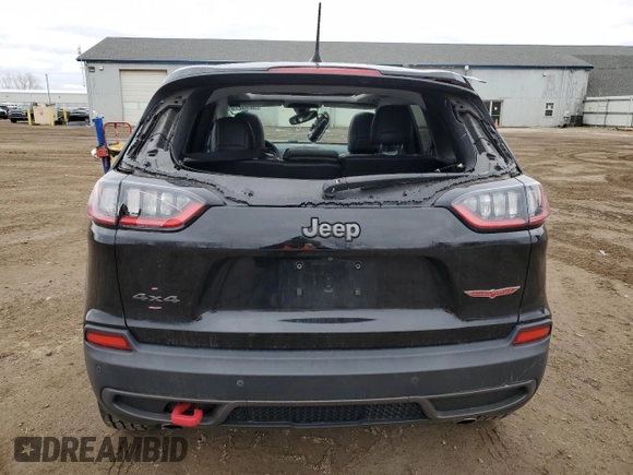 2019 Jeep Cherokee Trailhawk with VIN 1C4PJMBX7KD341534, listed as a Copart auction lot 52352765 with 207,532 mi miles and Salvage Title. Bid and sale history available at DreamBid. Image 6.