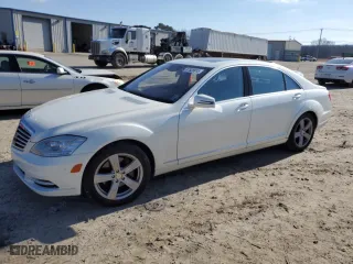 2010 Mercedes-Benz S-Class S 550 with VIN WDDNG7BBXAA297031, listed as a Copart auction lot 87528915 with 0 mi miles and Salvage Title. Bid and sale history available at carsss.com. Image 1.