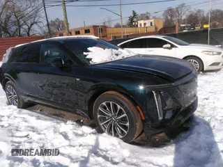 2024 Cadillac LYRIQ z VIN 1GYKPVRL8RZ128147, wystawiony jako IAAI lot #41273392 z przebiegiem 1 927 mil mil oraz . Historia ofert i sprzedaży dostępna na DreamBid. Obrazek 1.