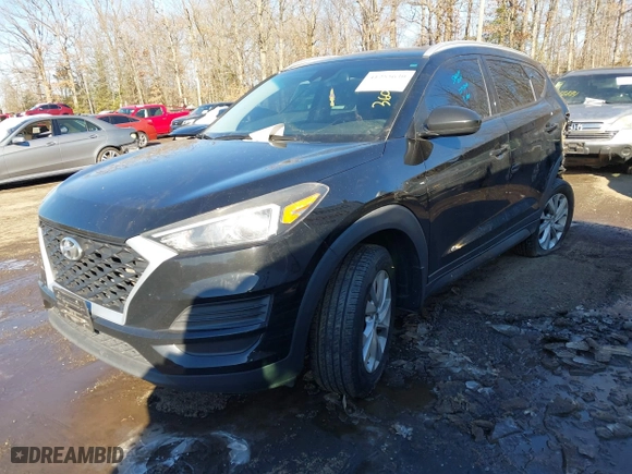 2019 Hyundai Tucson Value with VIN KM8J33A4XKU979791, listed as a IAAI auction lot 41255630 with 90,807 mi miles. Bid and sale history available at carsss.com. Image 2.