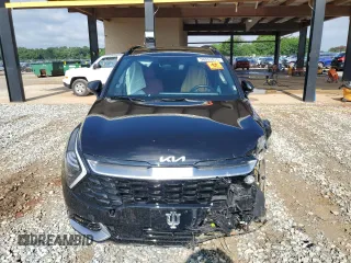 2023 Kia Sportage SX-Prestige with VIN KNDPXCAG4P7037500, listed as a Copart auction lot 56553875 with 34,906 mi miles and Salvage title. Bid and sale history available at DreamBid. Image 5.