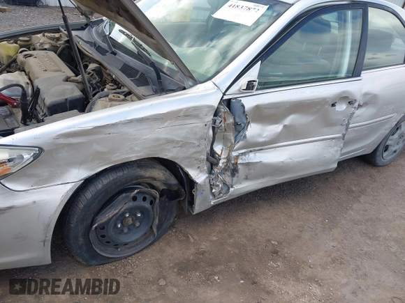 2004 Toyota Camry LE with VIN JTDBE32K640257695, listed as a IAAI auction lot 41837872 with 214,917 mi miles. Bid and sale history available at carsss.com. Image 6.