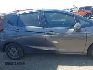 2018 Honda Fit LX with VIN 3HGGK5H51JM731851, listed as a IAAI auction lot 42570144 with 69,236 mi miles and . Bid and sale history available at DreamBid. Image 13.