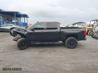 2014 Chevrolet Silverado 1500 LT with VIN 3GCUKREH4EG427604, listed as a IAAI auction lot 41403243 with 133,467 mi miles. Bid and sale history available at carsss.com. Image 14.