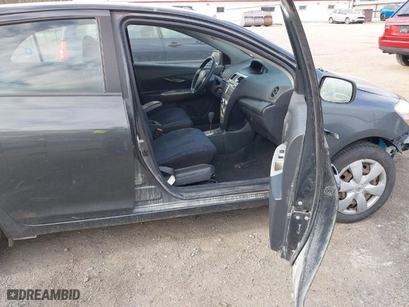 2007 Toyota Yaris with VIN JTDBT923371160020, listed as a IAAI auction lot 42044418 with 169,707 mi miles. Bid and sale history available at carsss.com. Image 5.
