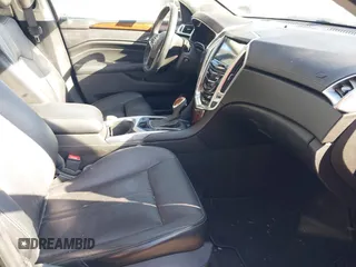 2014 Cadillac SRX Premium Collection z VIN 3GYFNDE34ES581728, wystawiony jako IAAI lot #41578226 z przebiegiem 121 118 mil mil oraz . Historia ofert i sprzedaży dostępna na DreamBid. Obrazek 5.