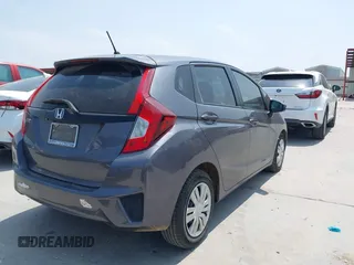 2015 Honda Fit LX with VIN 3HGGK5H55FM724750, listed as a IAAI auction lot 42282137 with 32,696 mi miles and . Bid and sale history available at DreamBid. Image 4.