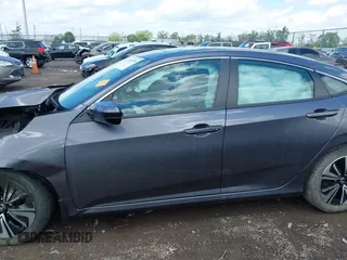 2018 Honda Civic EX-T z VIN 2HGFC1F34JH643975, wystawiony jako IAAI lot #42209799 z przebiegiem 58 684 mil mil oraz . Historia ofert i sprzedaży dostępna na DreamBid. Obrazek 14.