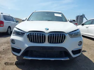 2018 BMW X1 xDrive28i with VIN WBXHT3C39J5F91912, listed as a IAAI auction lot 42099647 with 79,023 mi miles and . Bid and sale history available at DreamBid. Image 12.