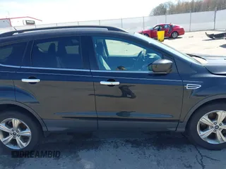 2015 Ford Escape SE with VIN 1FMCU9G9XFUC14744, listed as a IAAI auction lot 41967223 with 161,513 mi miles. Bid and sale history available at carsss.com. Image 14.