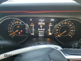 2020 Jeep Wrangler Unlimited Sahara Altitude with VIN 1C4HJXEG4LW314038, listed as a Copart auction lot 73728374 with 50,828 mi miles and Salvage title. Bid and sale history available at DreamBid. Image 9.