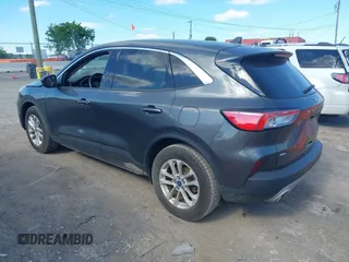 2020 Ford Escape SE z VIN 1FMCU0G63LUC26585, wystawiony jako IAAI lot #42332332 z przebiegiem 62 681 mil mil oraz . Historia ofert i sprzedaży dostępna na DreamBid. Obrazek 14.