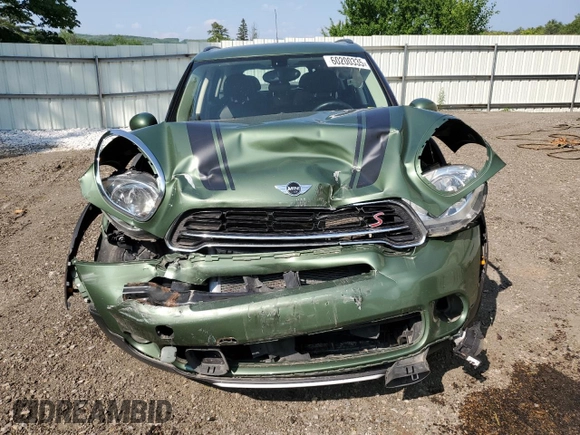 2015 MINI Countryman S with VIN WMWZC5C53FWP49039, listed as a Copart auction lot 60200335 with Not provided miles and Salvage title. Bid and sale history available at DreamBid. Image 5.
