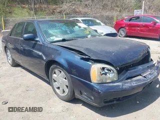 2002 Cadillac DeVille DTS with VIN 1G6KF57912U205527, listed as a IAAI auction lot 42064174 with 135,002 mi miles. Bid and sale history available at carsss.com. Image 1.
