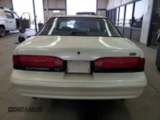 1995 Ford Thunderbird LX with VIN 1FALP62W9SH159185, listed as a Copart auction lot 51862975 with 128,230 mi miles and Clean Title. Bid and sale history available at carsss.com. Image 6.