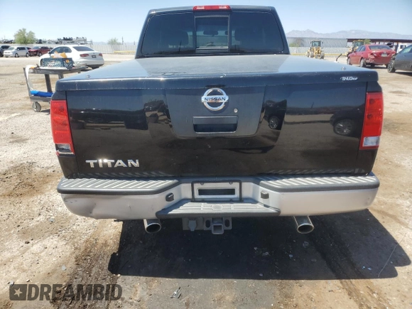 2011 Nissan Titan S with VIN 1N6AA0CH5BN309095, listed as a Copart auction lot 61105235 with 373,105 mi miles and Clean title. Bid and sale history available at DreamBid. Image 6.