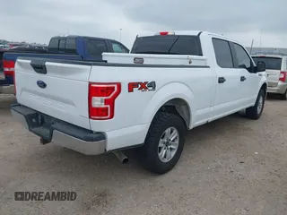 2018 Ford F-150 XL with VIN 1FTFW1E58JKE22834, listed as a IAAI auction lot 41923960 with 214,459 mi miles. Bid and sale history available at carsss.com. Image 4.
