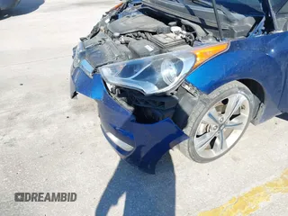 2016 Hyundai Veloster with VIN KMHTC6AD8GU302014, listed as a IAAI auction lot 41764406 with 102,893 mi miles. Bid and sale history available at carsss.com. Image 6.