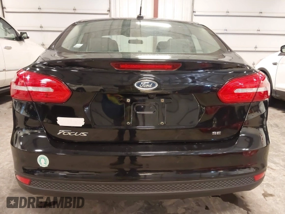 2018 Ford Focus SE with VIN 1FADP3F23JL215479, listed as a IAAI auction lot 41936036 with 96,560 mi miles. Bid and sale history available at carsss.com. Image 17.
