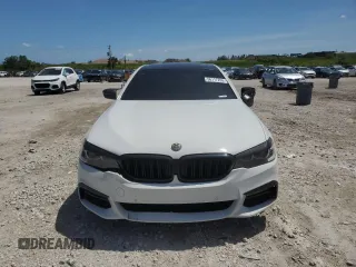 2018 BMW 5 Series 540i with VIN WBAJE5C58JWA96615, listed as a Copart auction lot 56117205 with 87,211 mi miles and Salvage title. Bid and sale history available at DreamBid. Image 5.