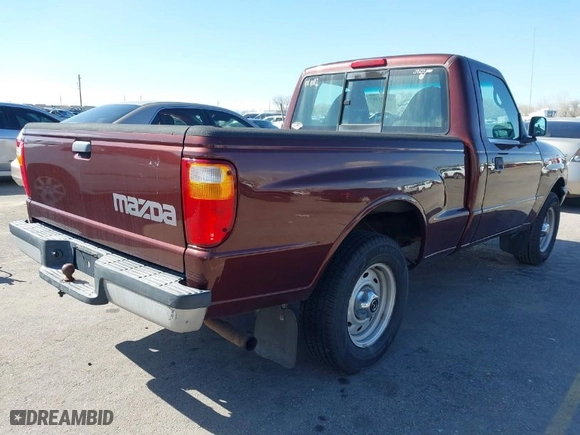 2003 Mazda B-Series 2WD Truck SX with VIN 4F4YR12D03TM09575, listed as a IAAI auction lot 41693387 with 173,882 mi miles. Bid and sale history available at carsss.com. Image 4.