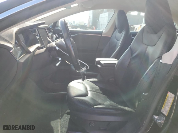 2015 Tesla Model S 85 kWh Battery with VIN 5YJSA1S12FFP67764, listed as a Copart auction lot 51000664 with 70,034 mi miles. Bid and sale history available at carsss.com. Image 7.