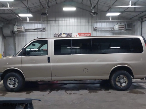 2012 Chevrolet Express Passenger 1LT with VIN 1GAZG1FAXC1127760, listed as a IAAI auction lot 41629882 with 311,110 mi miles. Bid and sale history available at carsss.com. Image 14.