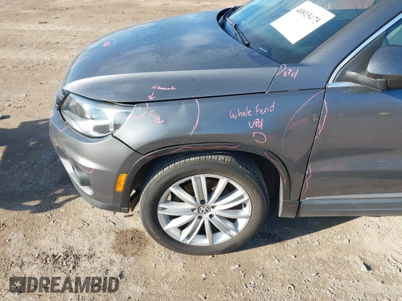 2012 Volkswagen Tiguan SEL with VIN WVGAV7AX2CW000962, listed as a IAAI auction lot 40815475 with 162,859 mi miles and . Bid and sale history available at DreamBid. Image 12.