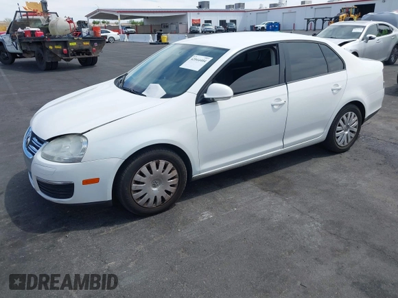 2010 Volkswagen Jetta Sedan S with VIN 3VWJZ7AJ9AM037277, listed as a IAAI auction lot 42044404 with 129,823 mi miles. Bid and sale history available at carsss.com. Image 2.