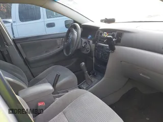 2005 Toyota Corolla CE with VIN 1NXBR32E85Z422330, listed as a IAAI auction lot 41931421 with 299,999 mi miles. Bid and sale history available at carsss.com. Image 5.