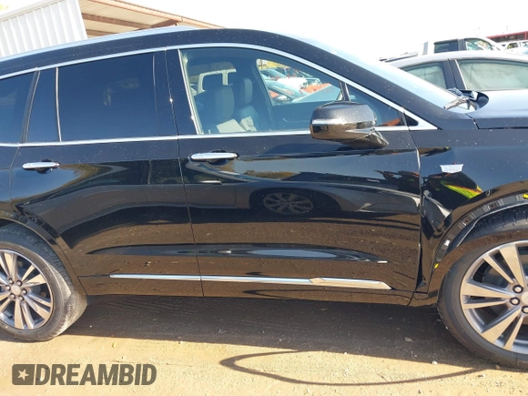 2025 Cadillac XT6 FWD Premium Luxury with VIN 1GYKPCRS1SZ118772, listed as a IAAI auction lot 41048190 with 131 mi miles. Bid and sale history available at carsss.com. Image 13.