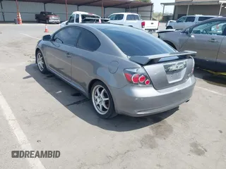 2007 Scion tC Spec with VIN JTKDE177870154969, listed as a IAAI auction lot 42125185 with 255,027 mi miles. Bid and sale history available at carsss.com. Image 3.