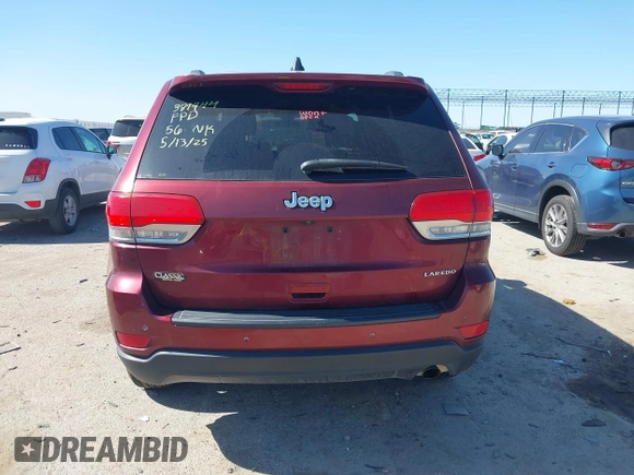 2019 Jeep Grand Cherokee Altitude with VIN 1C4RJEAG3KC851756, listed as a IAAI auction lot 42299986 with 119,115 mi miles and . Bid and sale history available at DreamBid. Image 17.