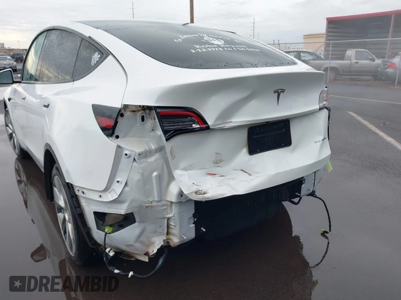 2020 Tesla Model Y Long Range z VIN 5YJYGDEE3LF043800, wystawiony jako IAAI lot #41590220 z przebiegiem 62 341 mil mil oraz . Historia ofert i sprzedaży dostępna na DreamBid. Obrazek 6.