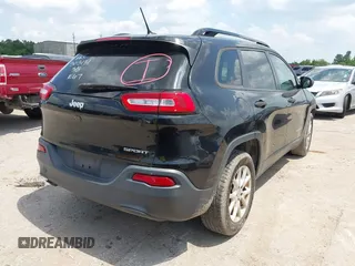 2016 Jeep Cherokee Sport with VIN 1C4PJLAB5GW297349, listed as a IAAI auction lot 42367544 with 142,930 mi miles and . Bid and sale history available at DreamBid. Image 4.