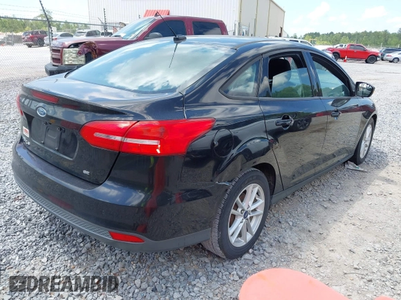 2017 Ford Focus SE with VIN 1FADP3F2XHL243371, listed as a IAAI auction lot 42147795 with 169,188 mi miles. Bid and sale history available at carsss.com. Image 4.