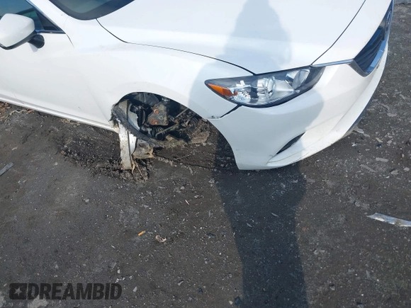 2016 Mazda Mazda6 i Sport with VIN JM1GJ1U55G1484856, listed as a IAAI auction lot 41543599 with 78,486 mi miles. Bid and sale history available at carsss.com. Image 6.