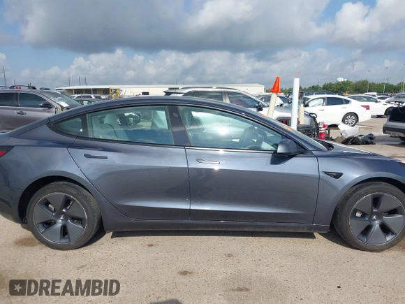 2023 Tesla Model 3 with VIN 5YJ3E1EA7PF567906, listed as a IAAI auction lot 42280993 with 41,452 mi miles and . Bid and sale history available at DreamBid. Image 14.