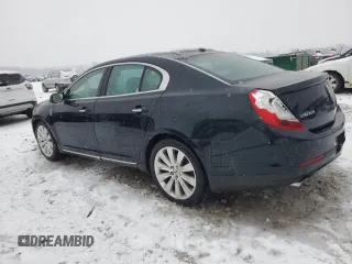 2014 Lincoln MKS EcoBoost with VIN 1LNHL9FT6EG608602, listed as a Copart auction lot 87018254 with 124,329 mi miles and Clean title. Bid and sale history available at DreamBid. Image 2.