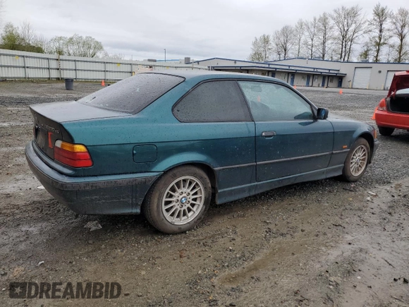 1997 BMW 3 Series 328is with VIN WBABG1320VET05383, listed as a Copart auction lot 52463975 with 236,590 mi miles and Clean Title. Bid and sale history available at carsss.com. Image 3.