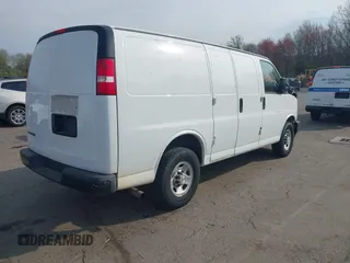 2017 Chevrolet Express Cargo Van with VIN 1GCWGAFF5H1133267, listed as a IAAI auction lot 42124337 with 162,899 mi miles. Bid and sale history available at carsss.com. Image 4.