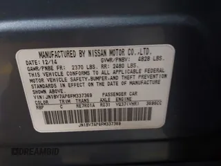 2015 Infiniti Q50 Premium z VIN JN1BV7AP6FM337369, wystawiony jako IAAI lot #41788419 z przebiegiem 106 977 mil mil oraz . Historia ofert i sprzedaży dostępna na DreamBid. Obrazek 9.
