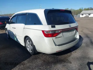 2012 Honda Odyssey Touring with VIN 5FNRL5H93CB146753, listed as a IAAI auction lot 41984850 with 155,309 mi miles and . Bid and sale history available at DreamBid. Image 3.