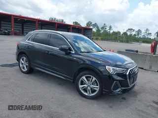 2020 Audi Q3 S line Premium Plus with VIN WA1EECF33L1052774, listed as a IAAI auction lot 42199200 with 55,008 mi miles and . Bid and sale history available at DreamBid. Image 1.