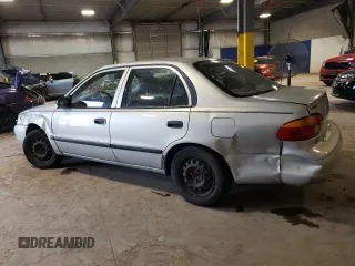 2002 Chevrolet Prizm z VIN 1Y1SK52862Z411433, wystawiony jako Copart lot #60319644 z przebiegiem 174 750 mil mil oraz Szkody całkowita. Historia ofert i sprzedaży dostępna na DreamBid. Obrazek 2.