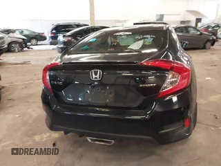 2019 Honda Civic Sport with VIN 19XFC2F89KE206213, listed as a IAAI auction lot 41804863 with 76,052 mi miles and . Bid and sale history available at DreamBid. Image 17.