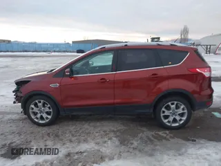2014 Ford Escape Titanium with VIN 1FMCU9J94EUA13509, listed as a IAAI auction lot 41291232 with 174,303 mi miles. Bid and sale history available at carsss.com. Image 15.