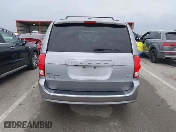 2014 Dodge Grand Caravan SXT with VIN 2C4RDGCG0ER417662, listed as a IAAI auction lot 41933279 with 156,751 mi miles and . Bid and sale history available at DreamBid. Image 16.
