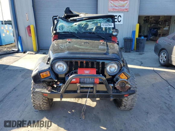 2004 Jeep Wrangler Rubicon with VIN 1J4FA69S74P785297, listed as a Copart auction lot 47332944 with 61,323 mi miles and Salvage Title. Bid and sale history available at carsss.com. Image 5.